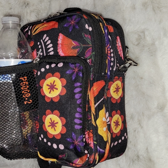 Black with flowers crossbody bag. Canvas holds bottle water. - Picture 2 of 8